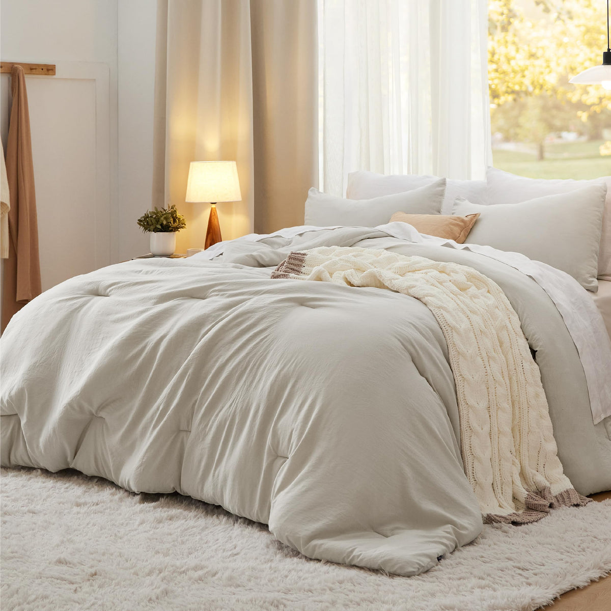 Bedsure king comforter set on bed in beige plush fabric for all-season warmth