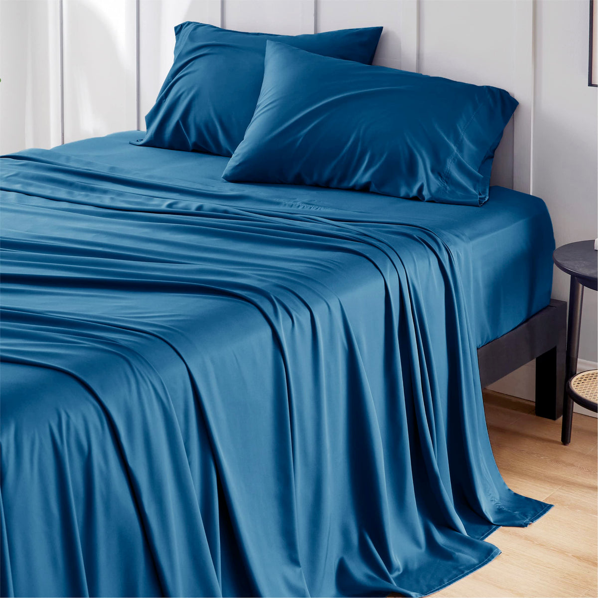 Bedsure king size cooling sheets in teal lie smooth on a bed, enhancing hotel luxury.