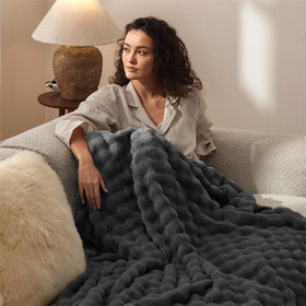 Bedsure lightweight warmth suitable for all seasons on couch and bed.