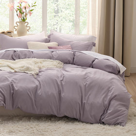 Bedsure lilac purple duvet cover set in a cozy queen bedroom for all-season comfort.