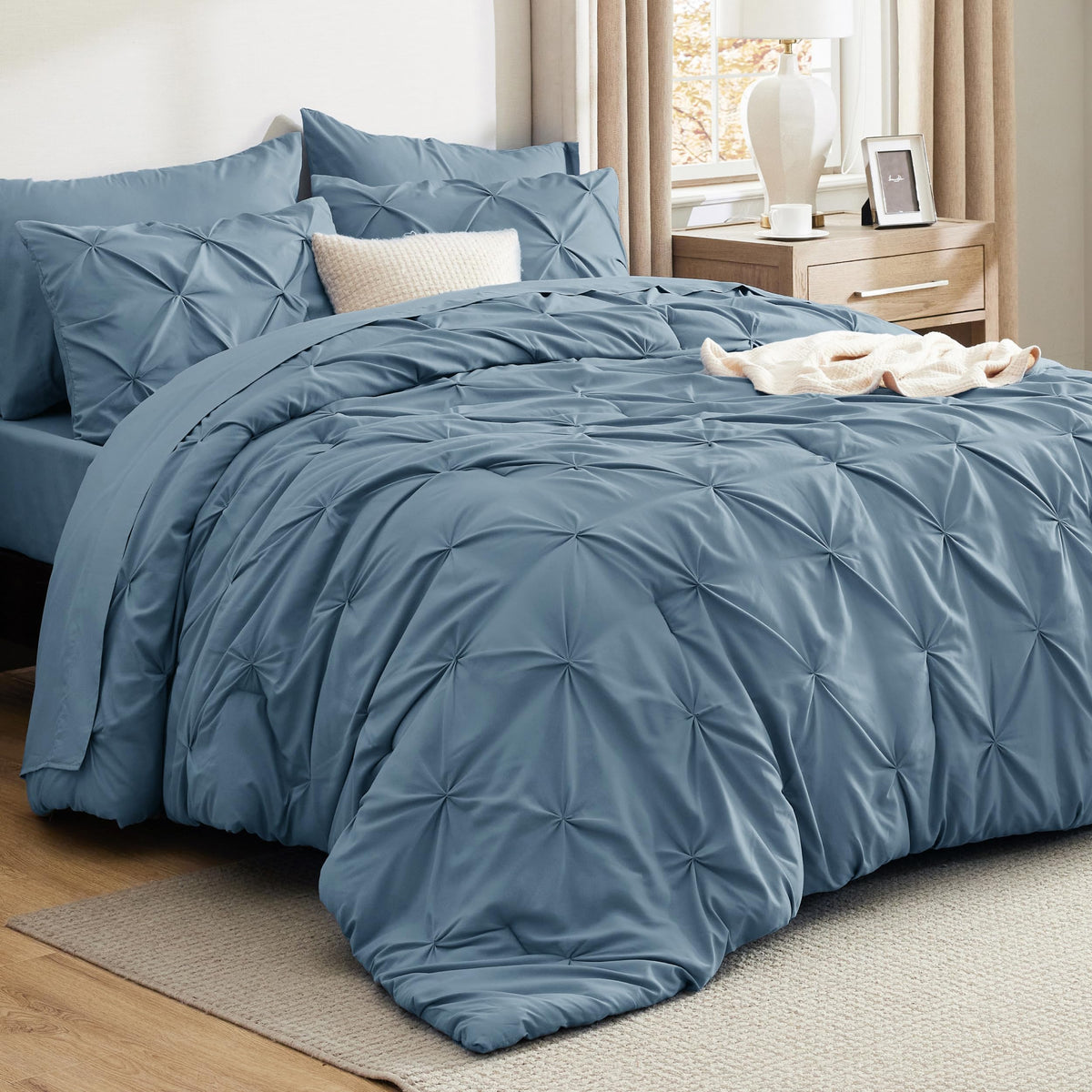 Bedsure mineral blue queen comforter set on a neatly made bed showing a polished look