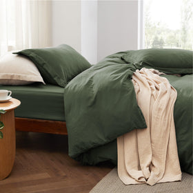 Bedsure olive-green bedding on a neatly made bed demonstrates versatile decor.