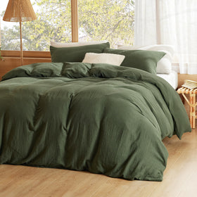 Bedsure olive green duvet cover close-up highlighting soft gauze weave and texture
