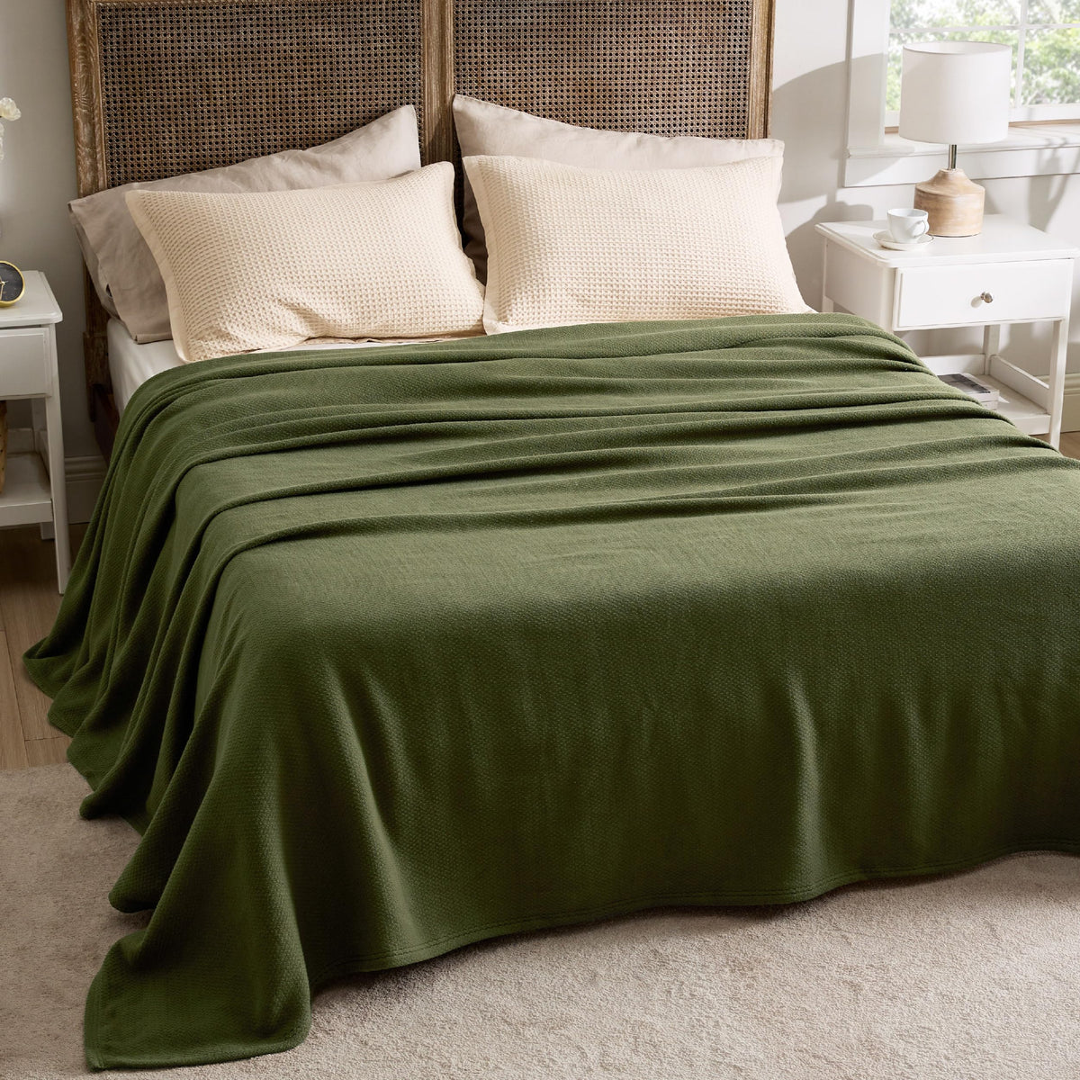 Bedsure olive green herringbone blanket adds elegant texture to rooms.