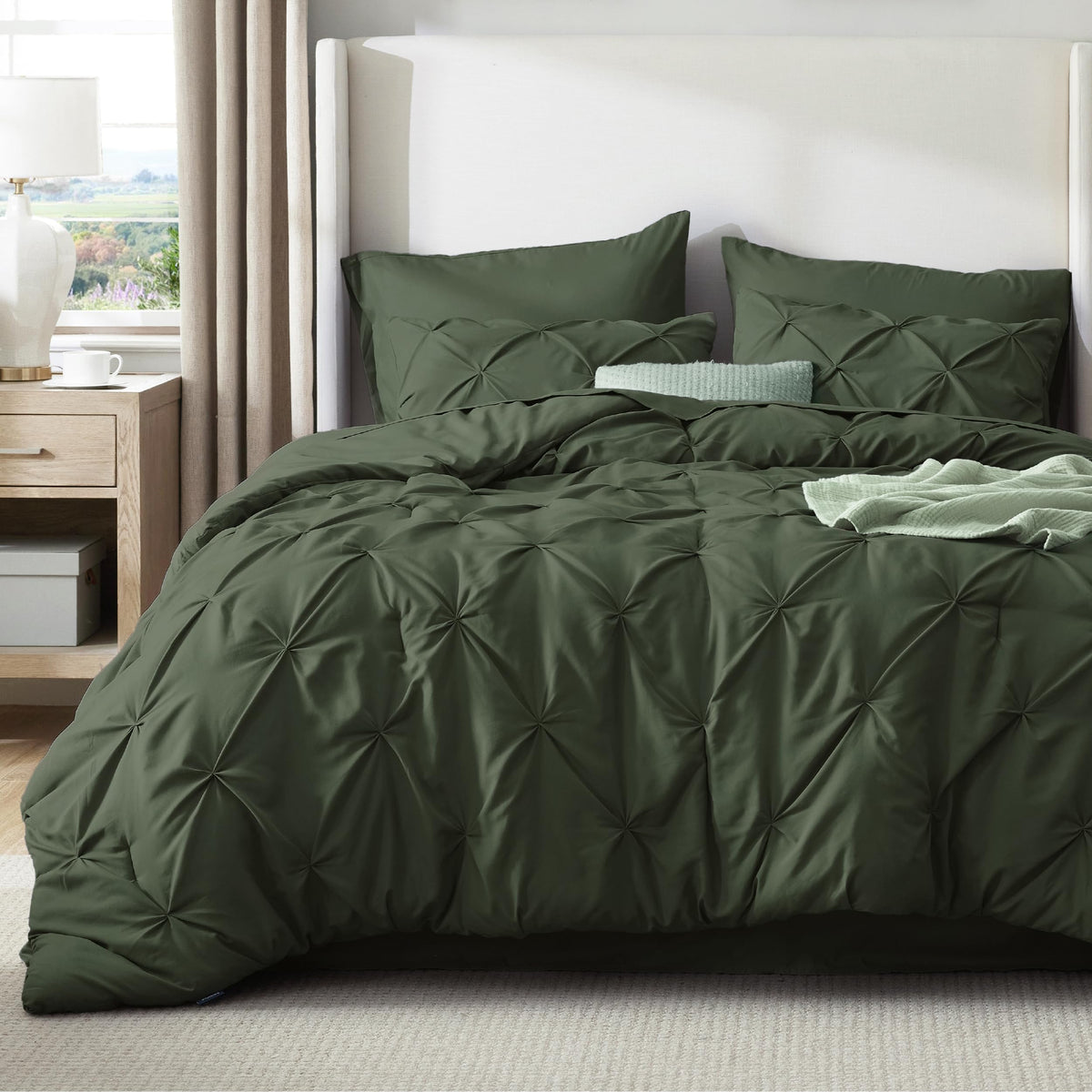 Bedsure olive-green sheets and pillowcases creating a soft sleeping surface.