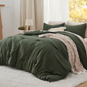 Bedsure green comforter close-up texture shows cotton-like weave and gentle touch