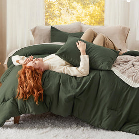 Bedsure oversized queen comforter set in dark green, front view on bed for all-season coziness