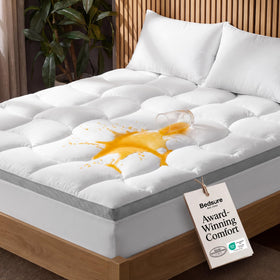 Bedsure queen pillow top topper with waterproof layer protects the mattress from spills.