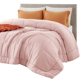 Bedsure pink comforter on bed in a cozy bedroom for all-season warmth