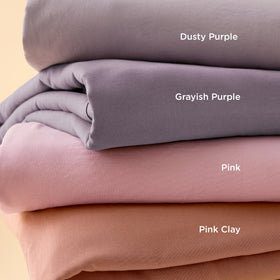 Bedsure pink clay queen set in a cozy bedroom ready for dressing