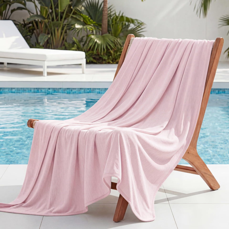 Bedsure pink cooling blanket on bed delivers refreshing comfort for warm nights.