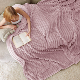 Bedsure pink blanket folded display adds neat bedside styling.