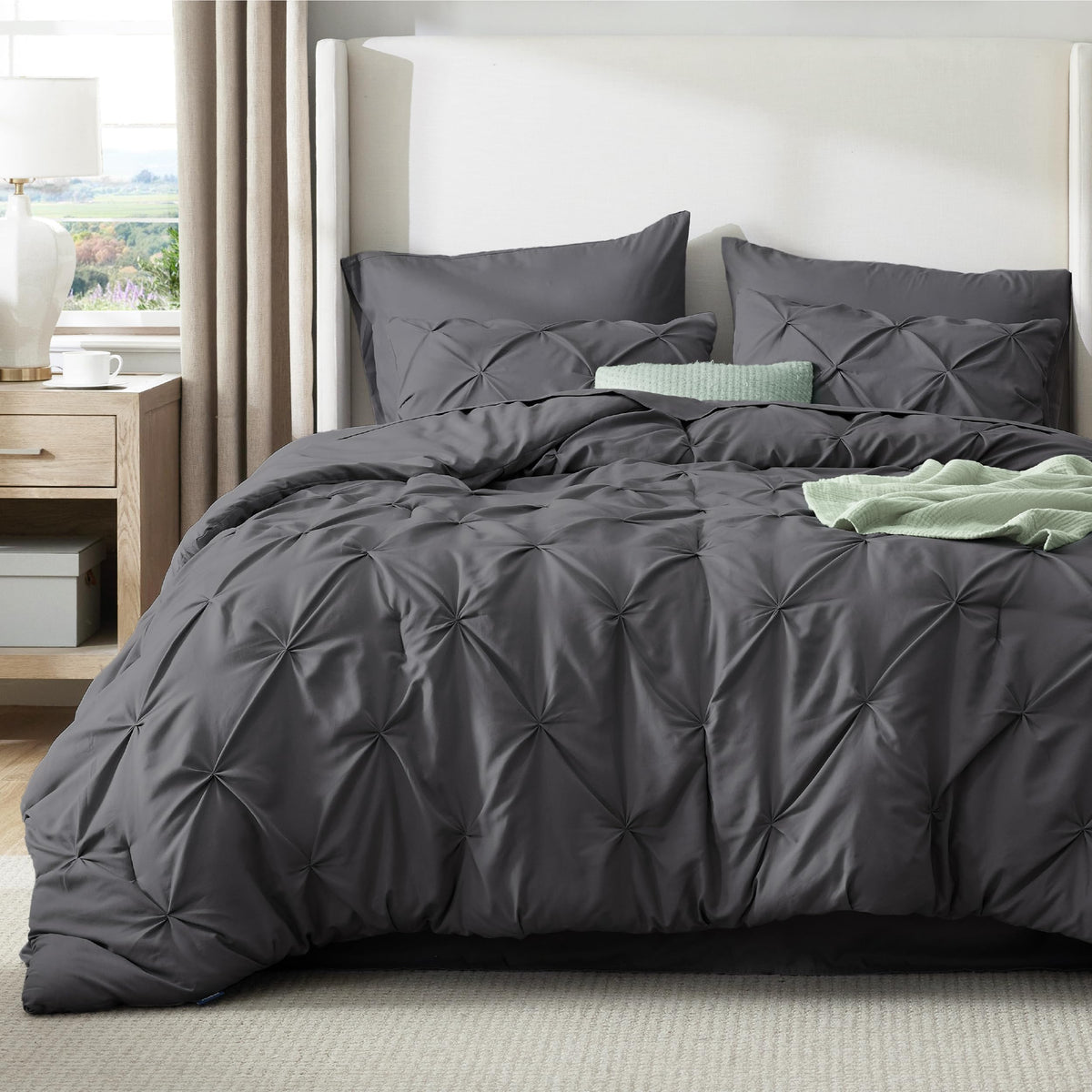 Bedsure bed-in-a-bag arrangement in dark grey on neatly made bed