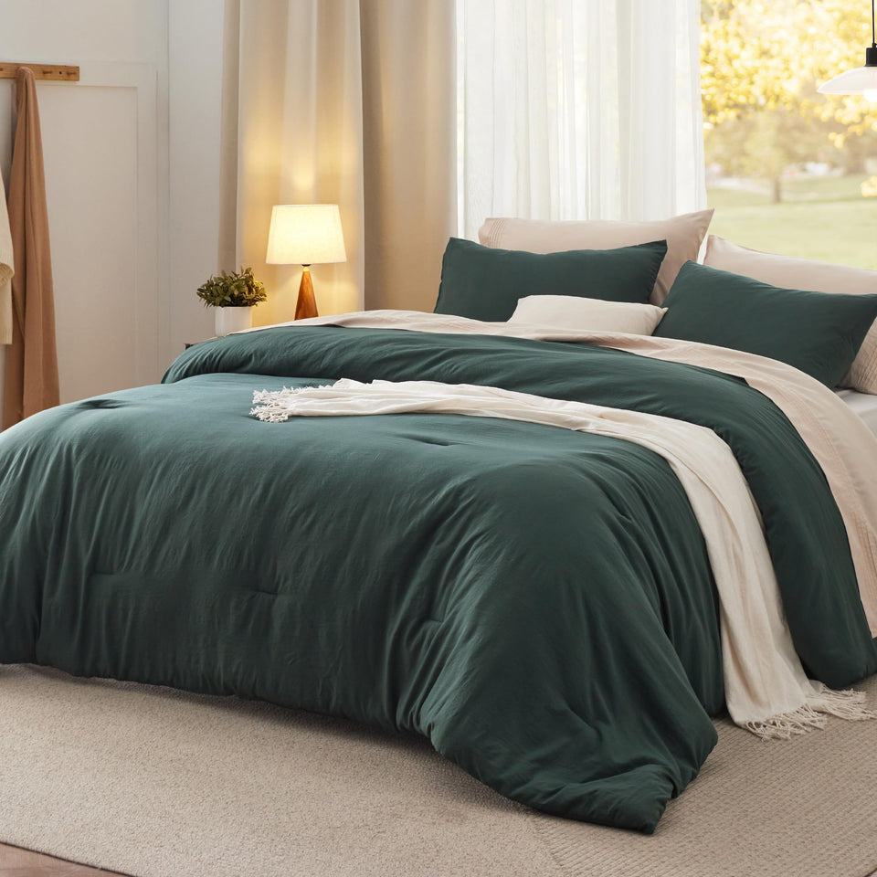 Bedsure queen comforter set in forest green on bed showing plush softness