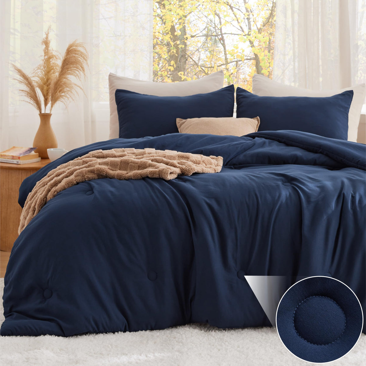 Bedsure queen comforter navy circle design close-up, plush and breathable warmth for year-round comfort.