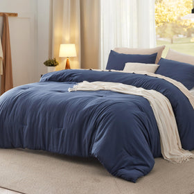 Bedsure queen comforter navy soft closeup shows plush texture for cozy nights.