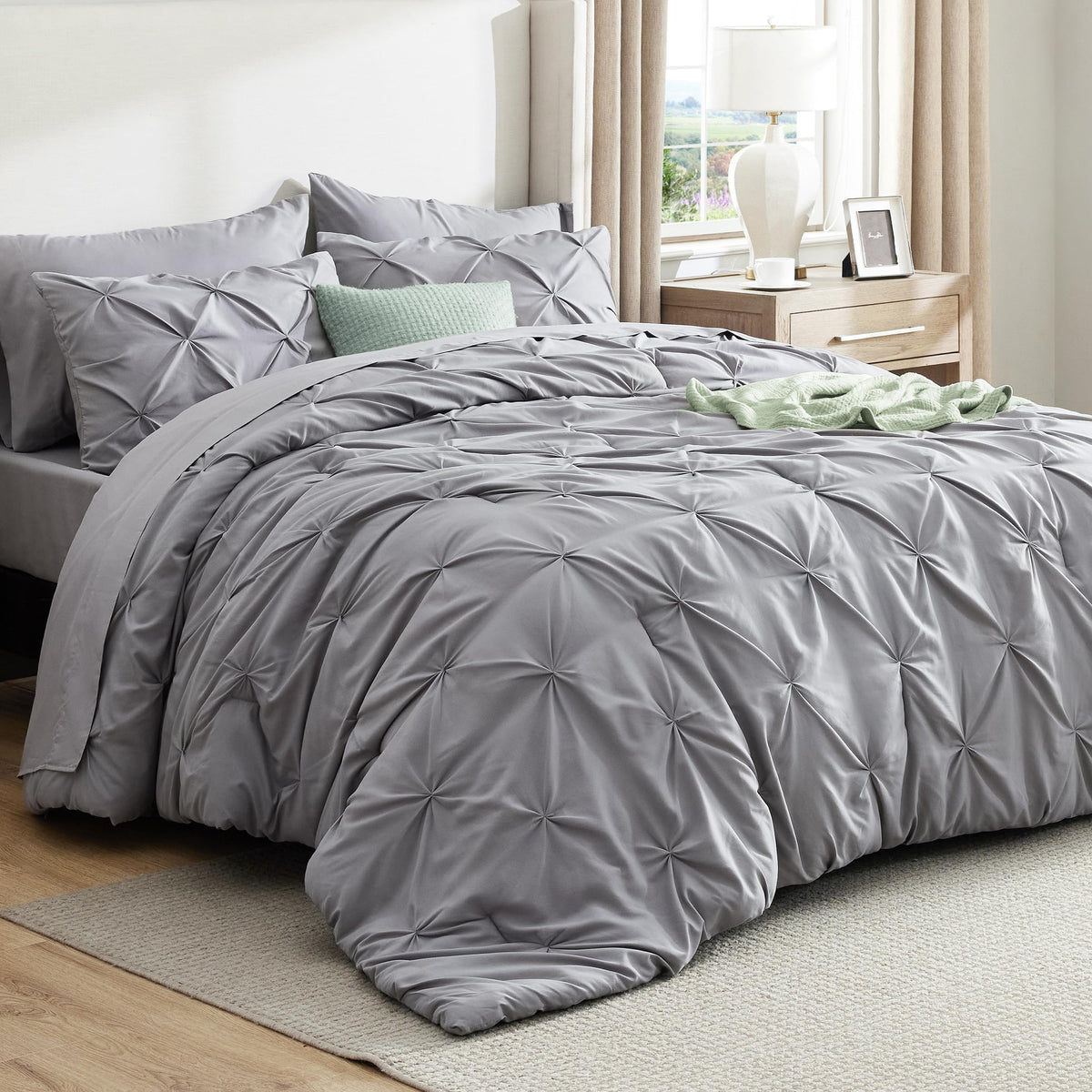 Bedsure queen comforter set grey on bed offers soft all-season comfort.