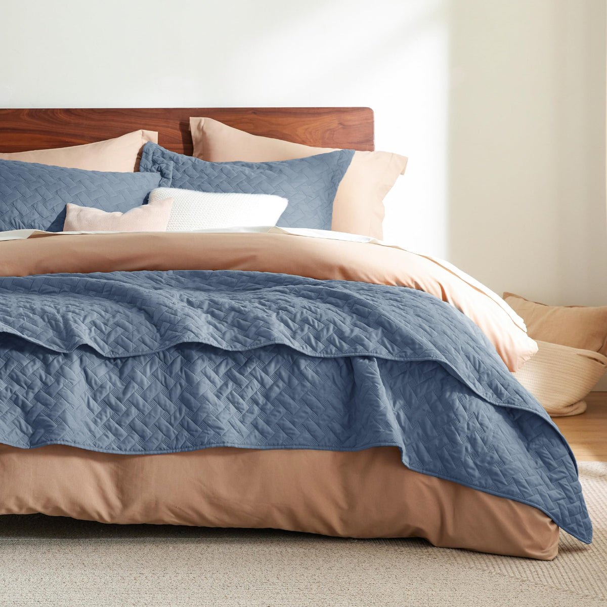 Includes a queen quilt and two matching pillow shams for complete styling.