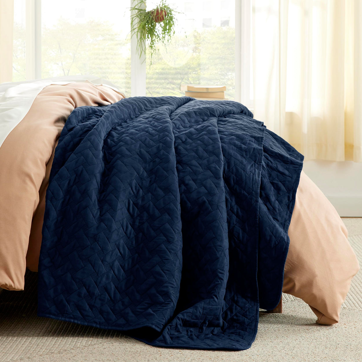 Bedsure quilt closeup shows soft brushed fabric for quiet, cozy nights.