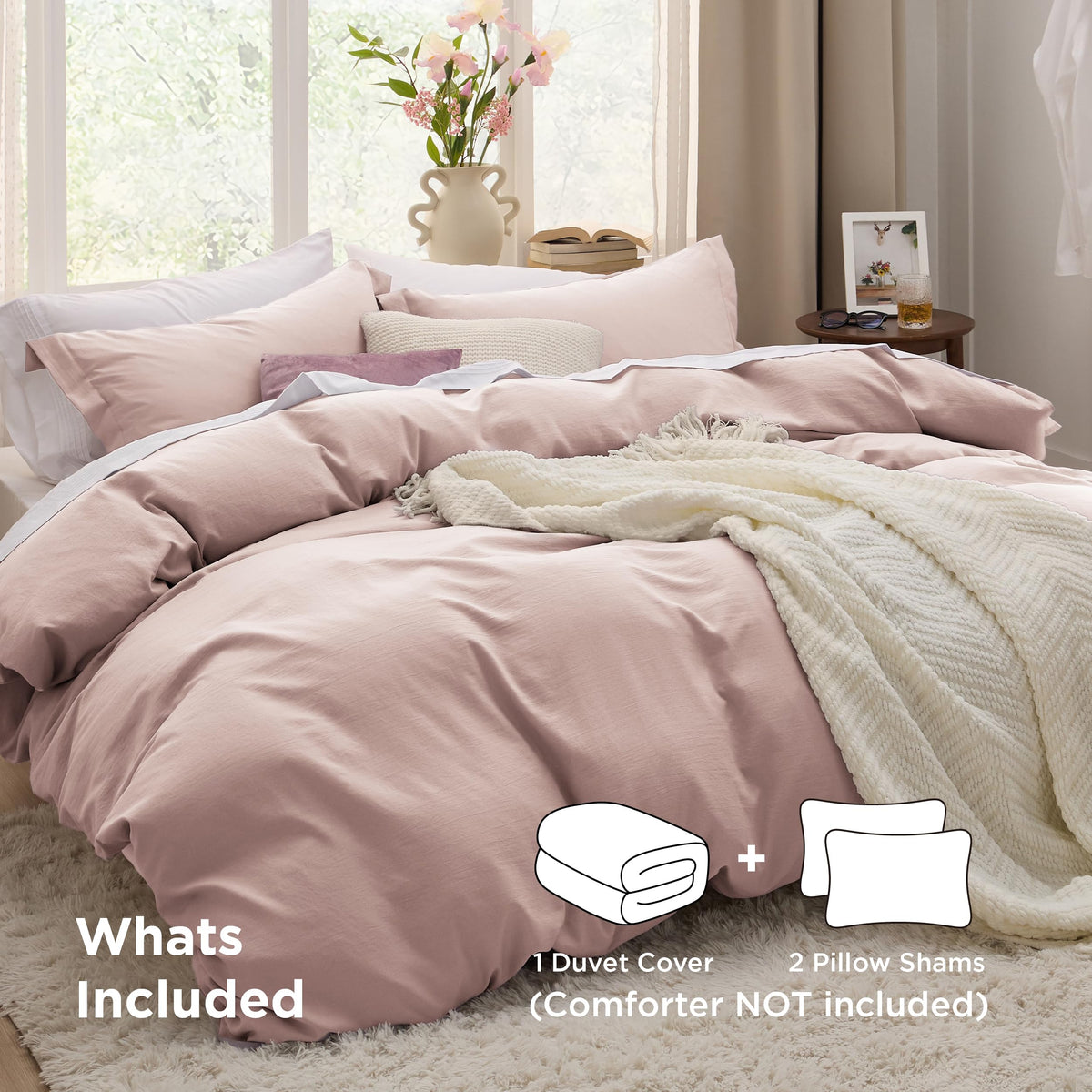 Bedsure Rose Pink fabric close-up shows soft microfiber texture and smooth feel.