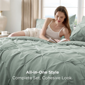 Bedsure sage green pintuck detail on bed with cozy textiles
