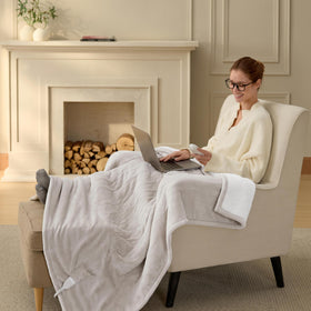Bedsure sherpa backing reveals plush, year-round comfort.