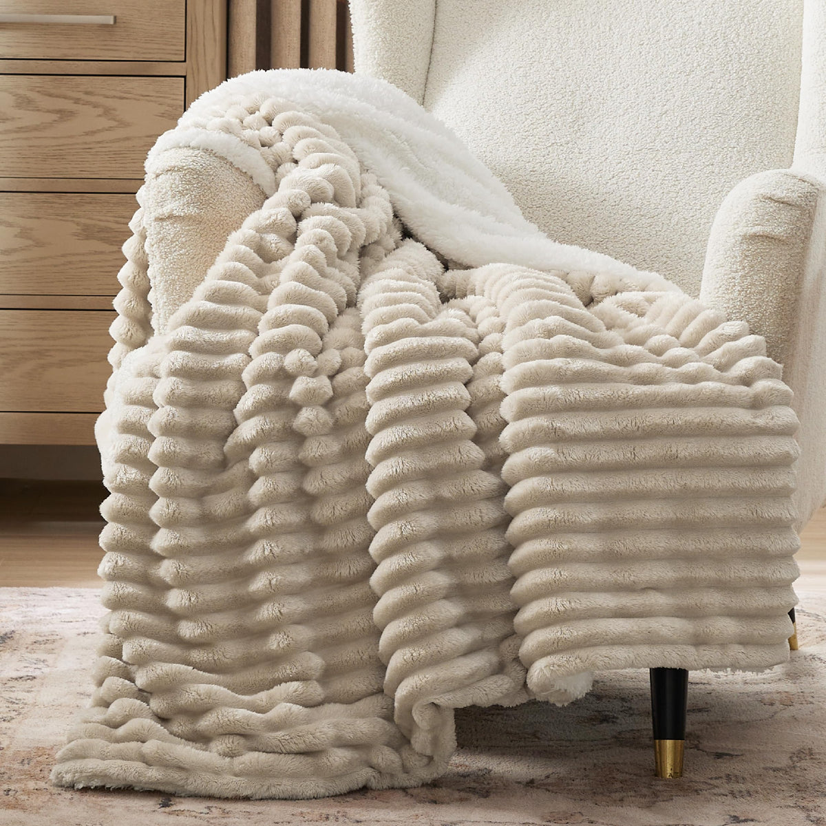 Bedsure Sherpa blanket with stripe pattern on sofa adds cozy ambiance.