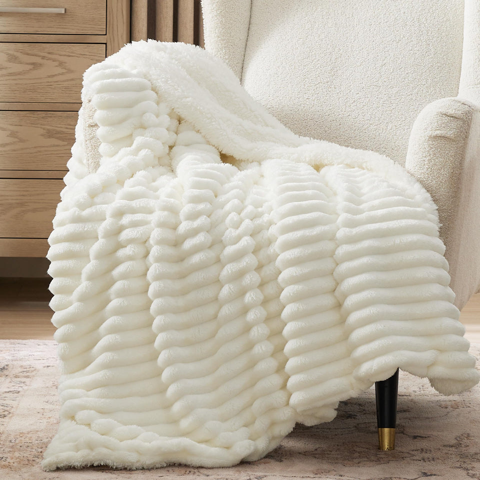 Bedsure Sherpa Throw Blanket with stripe pattern adds elegant warmth to living room.