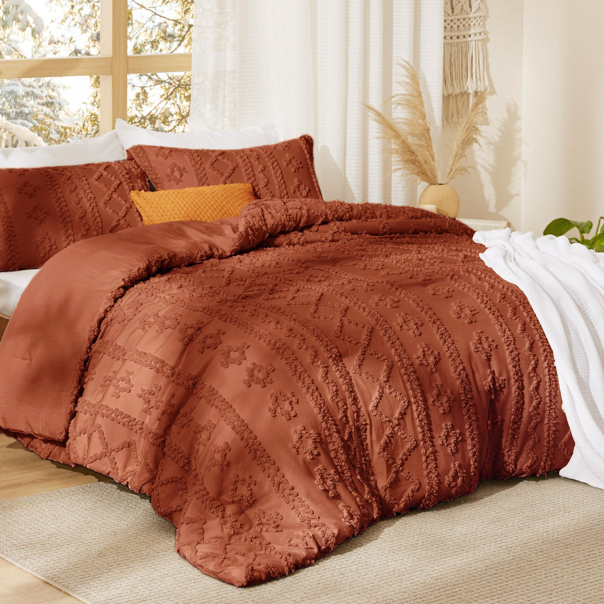 Bedsure terracotta boho embroidery close-up shows 3D tuft texture and depth.