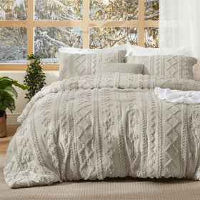 Bedsure tufted boho comforter close-up shows 3D tufting texture