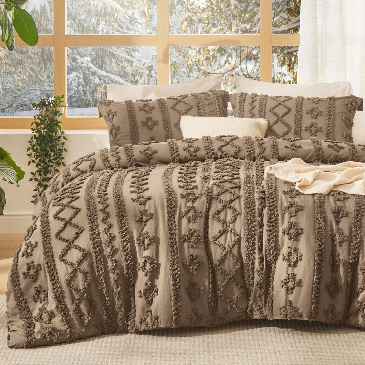 Bedsure tufted boho queen comforter detail shows 3D embroidery texture for depth.