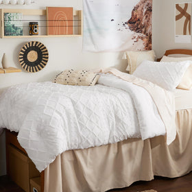 Bedsure comforter with embroidered tufts adding chic dorm detail