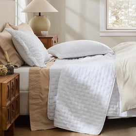 Bedsure bright white cover with Clover motif enhances a clean bedroom look