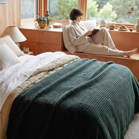 Bedsure versatile blanket for bed, sofa, or travel, adding elegance anywhere.