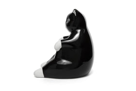 Bee! Ceramic Lazy Black Cat coffee pod holder stores pods neatly.
