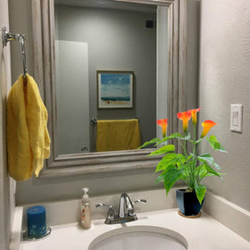 Beebel orange Calla Lily adds warmth to living spaces with realistic faux petals.