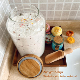 Beeco GIF2U classic glass canister with wood lid adds rustic bathroom charm.