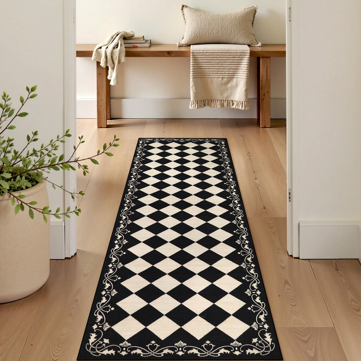 Beeiva black and white checkered rug complements entryways and kitchen decor.