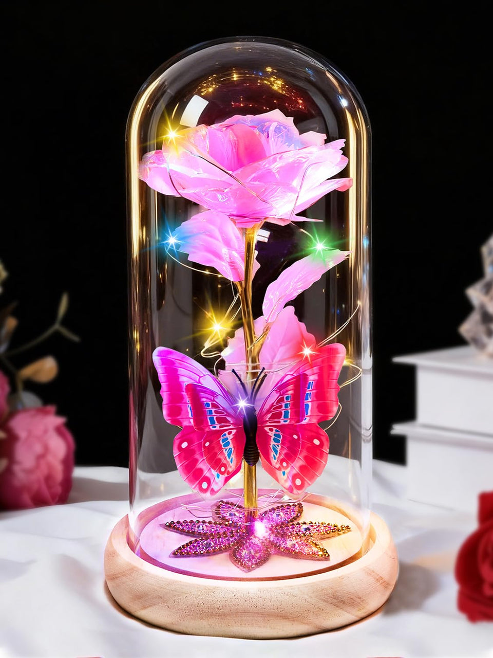 Beferr Galaxy Glass Rose in a dome illuminates rooms with warm LED glow.
