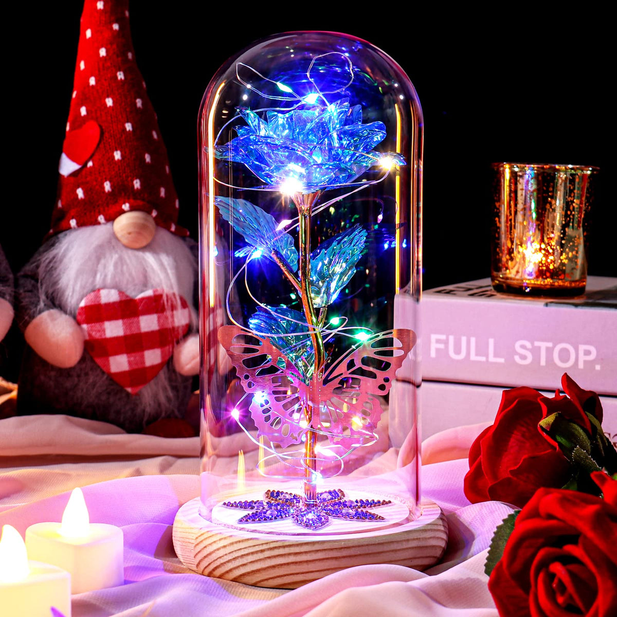 Beferr galaxy glass rose on a wood base glows with crystal accents.