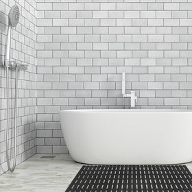 Textured surface provides confident footing during showers