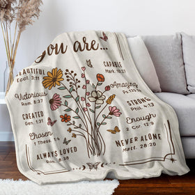 BeneCharm beige 50x60 blanket folded on bed adds cozy decor and warmth.