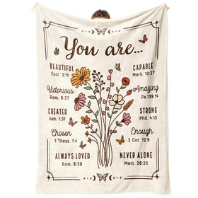 BeneCharm Christian floral throw blanket on sofa offers cozy, scripture-inspired warmth.