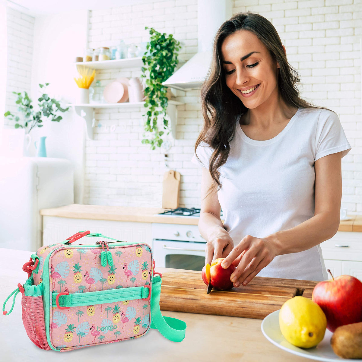 Bentgo Kids Lunch Bag tropical water-resistant fabric resists spills after school.