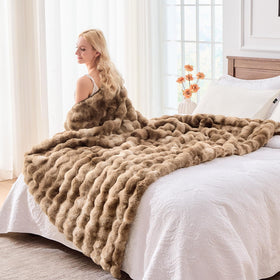BENVWE 51x63 inch cozy lounge throw adds plush texture to spaces.
