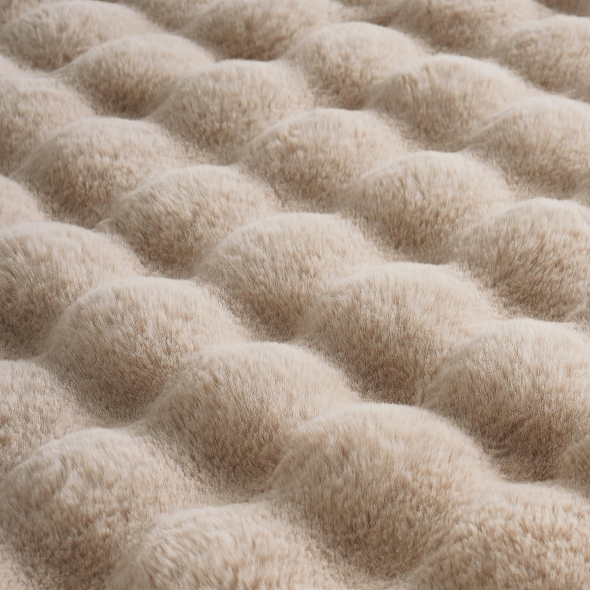 BENVWE beige faux fur throw on a bed or couch for cozy ambiance