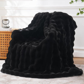 BENVWE faux fur throw blanket on couch, ultra-soft texture for warm, cozy lounging.