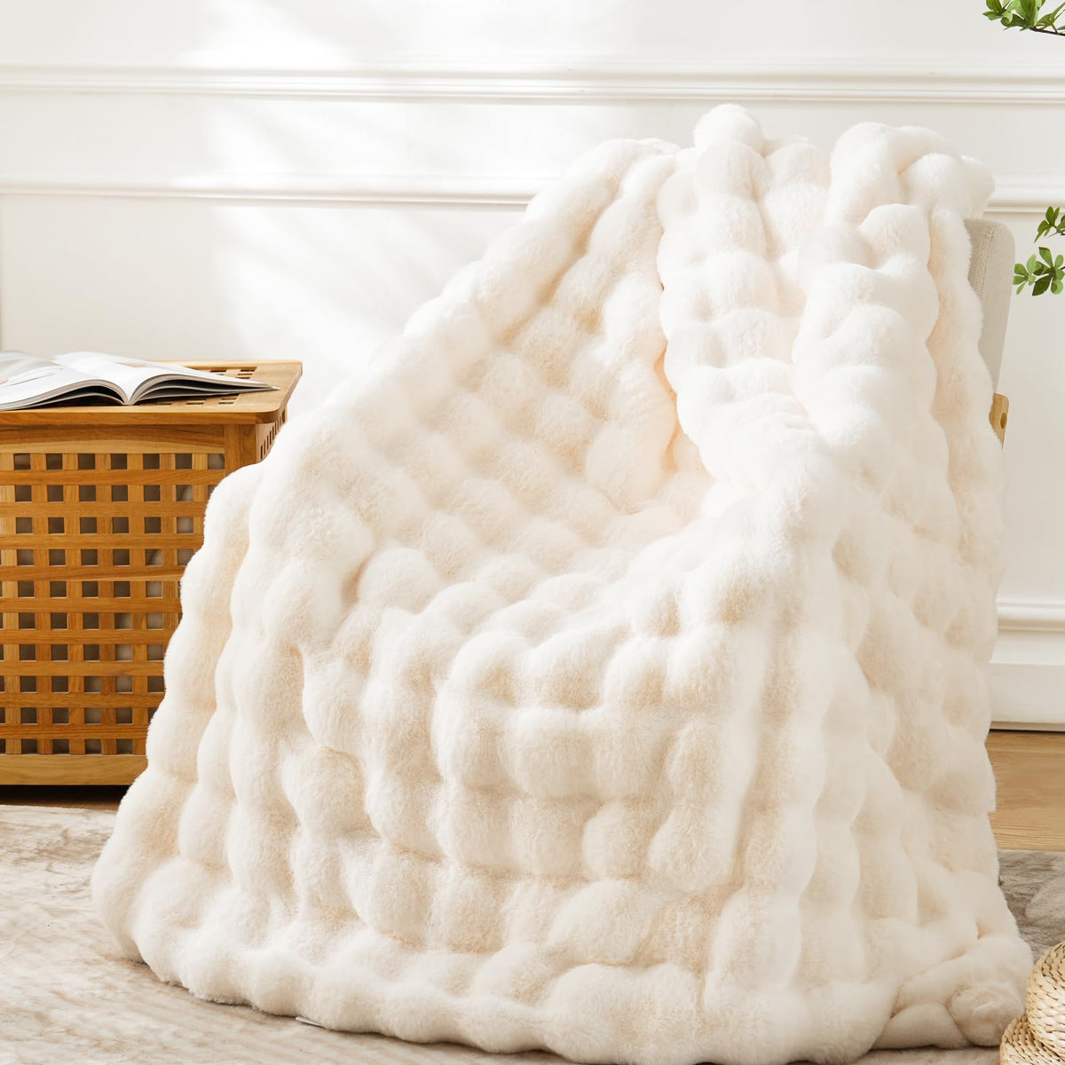 BENVWE faux fur throw blanket in cream 63x80, perfect for cozying up on the couch.