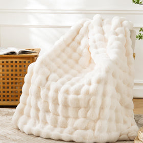 BENVWE faux fur throw blanket in cream 63x80, perfect for cozying up on the couch.