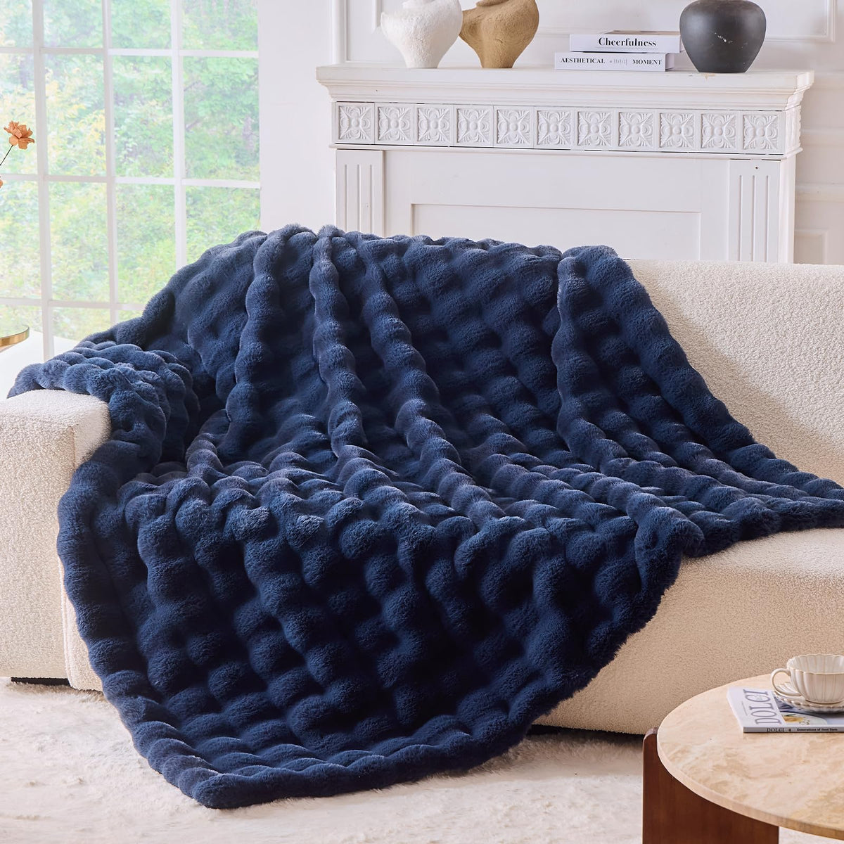 BENVWE fluffy faux fur throw navy on couch adds instant cozy warmth